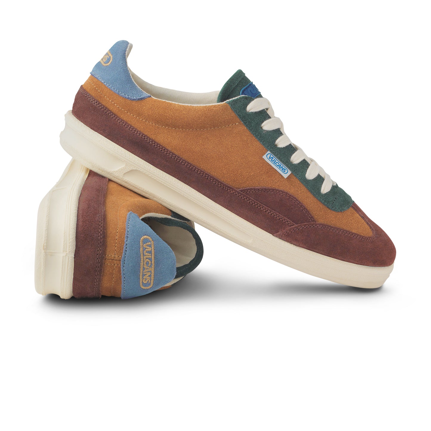 Brown and blue sneakers with organic off white laces.